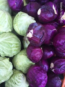 Green and purple cabbages. La Cienega Farmers Market