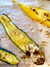 Rolling zucchini filled with rice mixture.